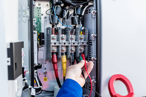 the inspector checks the actual output voltage level of inverter.